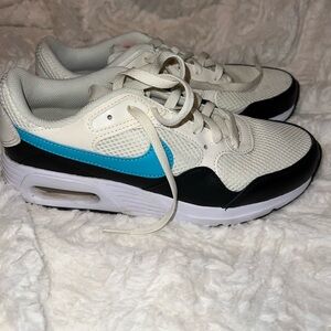 Nike women’s White and Blue Sneakers